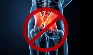Illustration av bäckenet med markerad smärta, symboliserar att det är stopp för ont i piriformis.